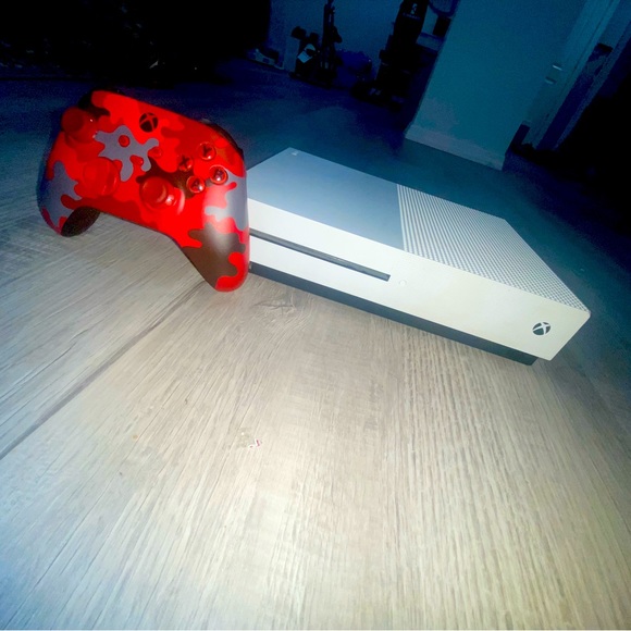 Xbox console with controller